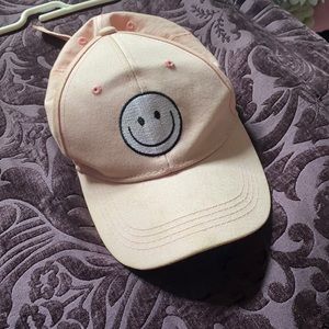 Light pink smiley face hat